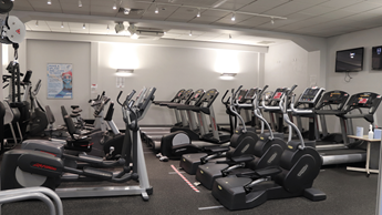 Newton Abbot Leisure Centre Gym with cardio and cable machines.