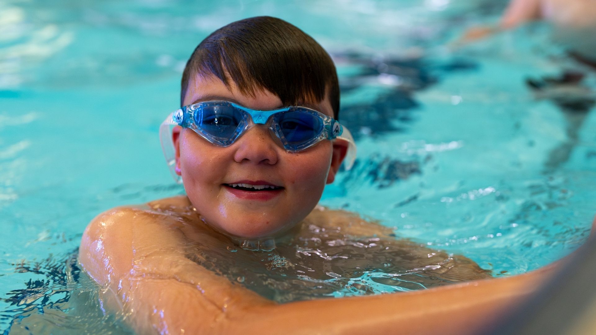 Child in Swimming Lessons.